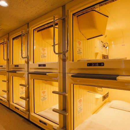 Отель Capsule Land Yushima Токио Экстерьер фото