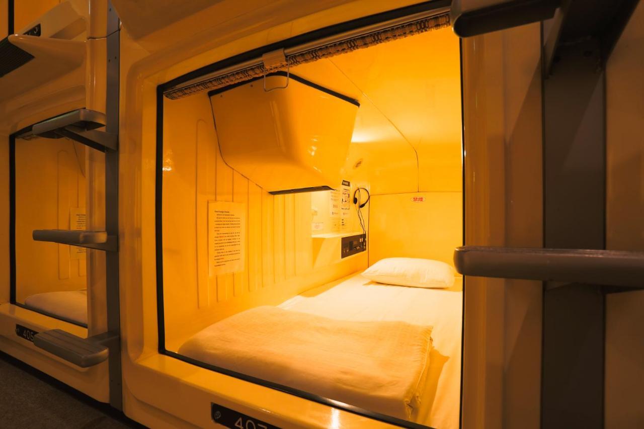 Отель Capsule Land Yushima Токио Экстерьер фото