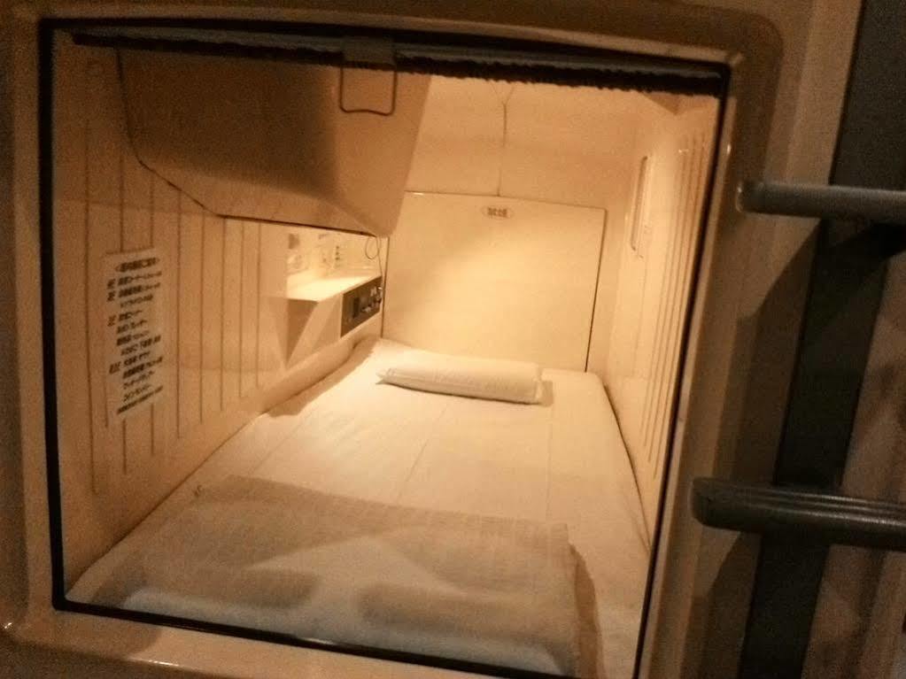 Отель Capsule Land Yushima Токио Экстерьер фото
