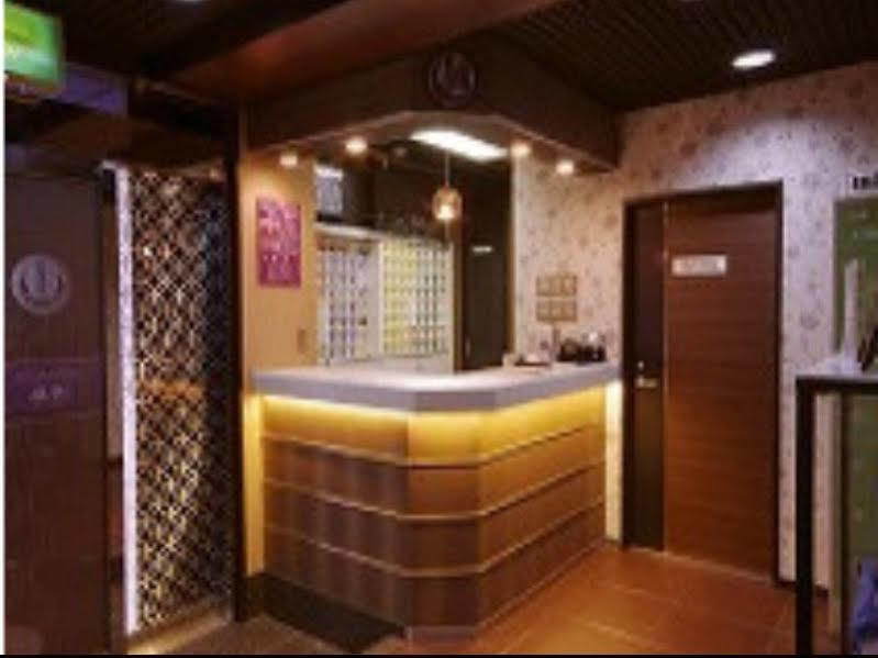 Отель Capsule Land Yushima Токио Экстерьер фото